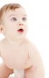 portrait of crawling baby boy looking up 2