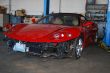 Dusty Damage red Sportscar