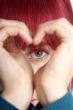 woman shows heart