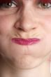 woman holds breath