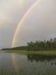 Rainbow over wood lake