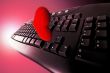 Concept Dating on-line in red. Keyboard and heart.