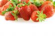 fresh bright juicy strawberry over white