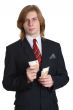 a businessman in a suit considering money