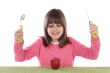 Girl with red apple
