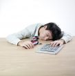 Businessman sleeping on a table