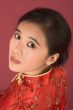 Chinese girl in red cheongsam