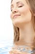 bright picture of smiling woman in water