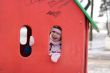 girl play hide-and-seek at the playground