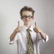 Boy giving two thumbs up
