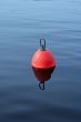 plastic buoy on the blue water