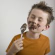 Boy eating chocolate
