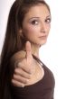 woman shows thumb