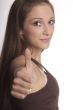 woman shows thumb