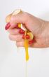 The female hand presses an egg on the night of February, 29th
