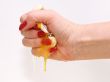 The female hand presses an egg on the night of February, 29th