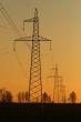 row of electricity pylons