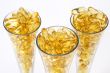 Three glasses with gold boluses
