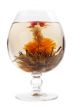 Glass with a flower green tea