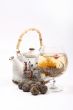 Teapot and Glass with a flower green tea