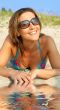 smiling bikini girl on sand