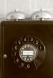 black retro telephone on white