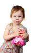 little beauty girl with toy hedgehog