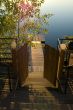 Open door of a ladder to lake