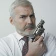 Man holding a revolver