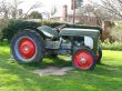 Old Tractor in Green Field