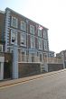 Grand Old Building Flying St Georges Flag