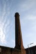 Partial Silhouette of Old Industrial Chimney