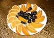 Orange Segments and Black Grapes