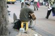 Busker with Electric Guitar