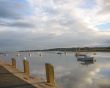 Boats on an English River at Sunset