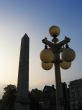 Cleopatra`s Needle and Old Streep Lamp Silhouette