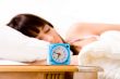 Alarmclock about to wake her up