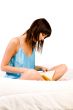 Reading while sitting on the bed
