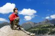 Teens boy in mountains hike in  vocations