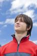 Boy teens looking to blue skies, outdoors