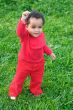 Baby playing on the grass