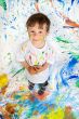 Boy playing with painting