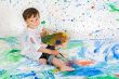 Boy playing with painting