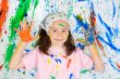 Girl playing with painting
