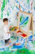 Boy playing with painting