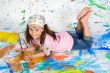 Girl playing with painting