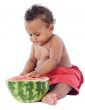 Baby eating watermelon
