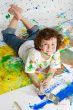 Boy playing with painting