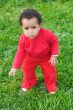 Baby playing on the grass