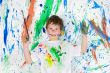 Boy playing with painting